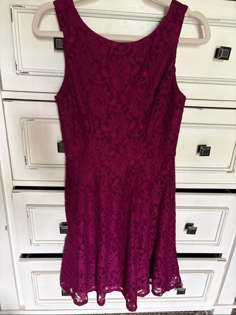 Macy’s Sleeveless Floral Lace Sleeveless Mini Dress in raspberry.